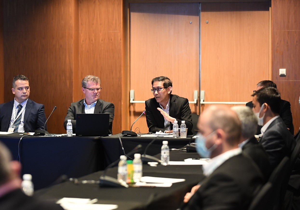 (3rd from left) Dr Victor Khoo in a discussion at a UNGGIM meeting hosted by SLA in Singapore in May 2022